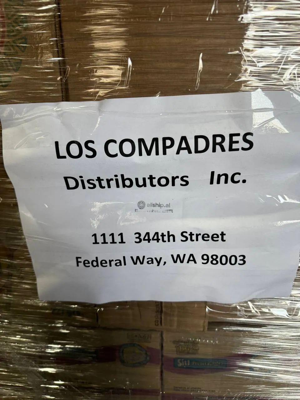 Shipping label on a wrapped pallet