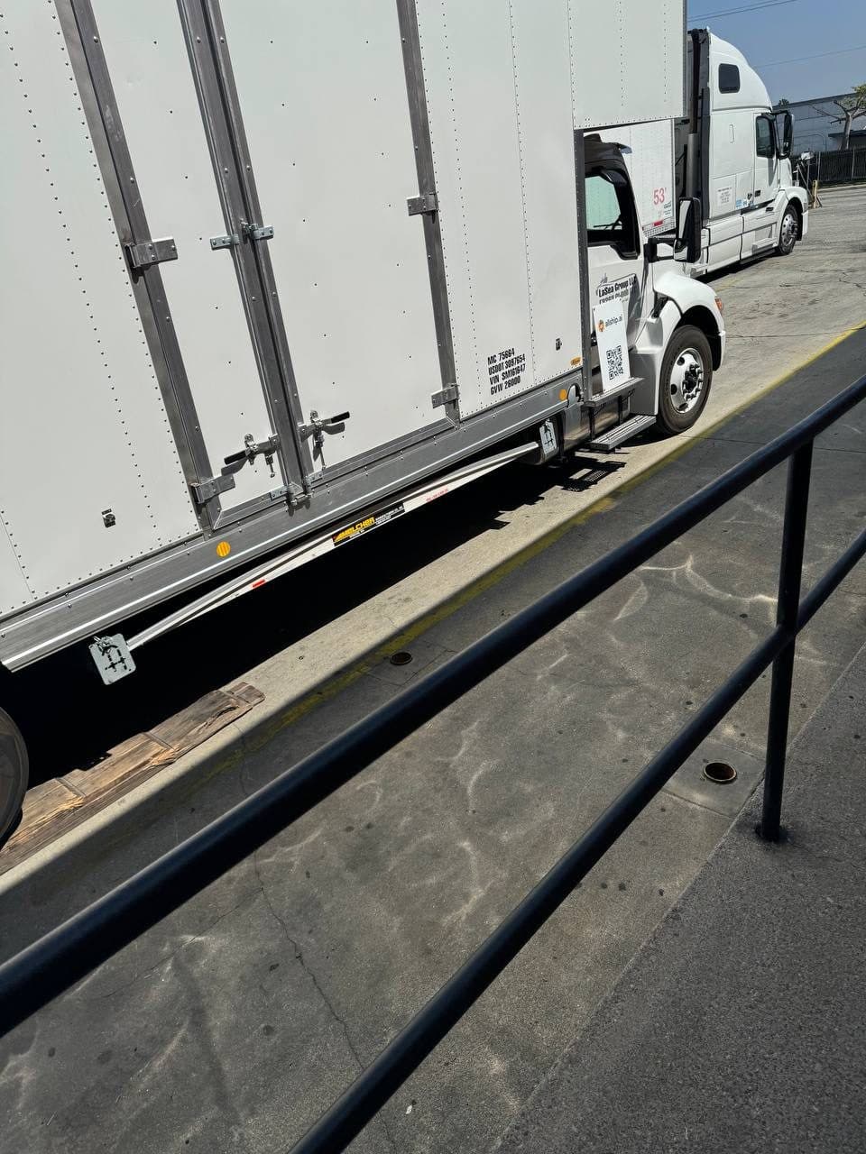 Box truck parked in a yard